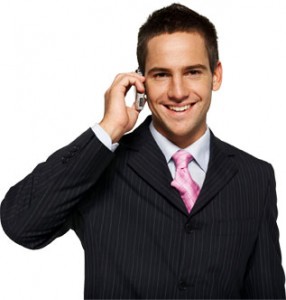 Smiling man talking on phone