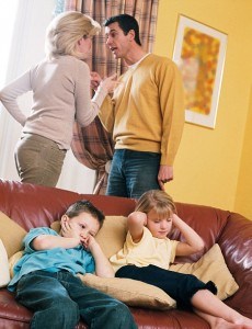 Parents arguing in front of children