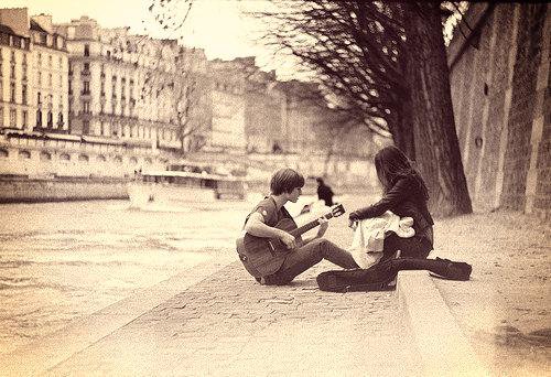 Man playing guitar in the street