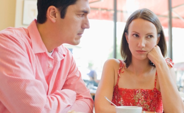 Couple fighting at the table