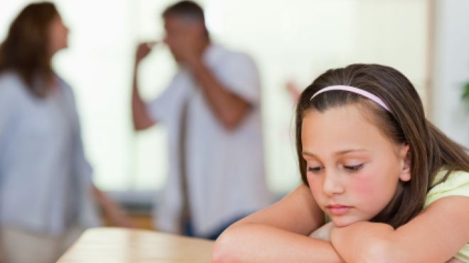 Child listening to parents fight