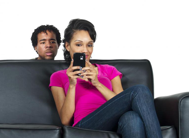 Man checking out wife's phone activity
