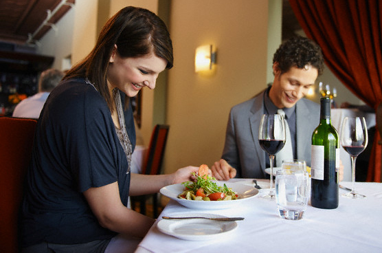 Man and woman enjoying dinner