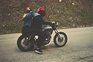 Couple on a motorbike.