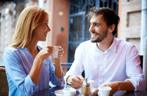 man and woman on a coffee date