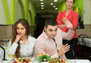 man being rude to waitress 