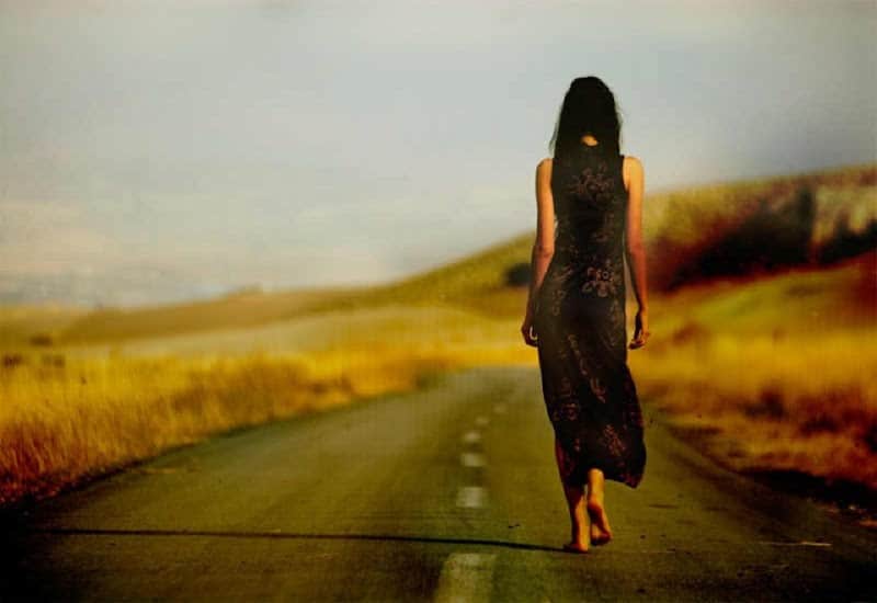 woman walking away