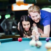 couple playing pool on date