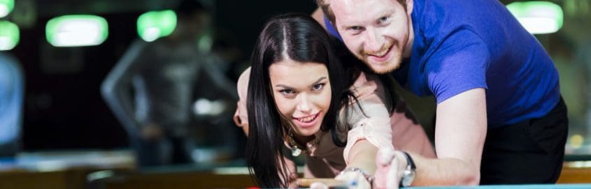 couple playing pool on date