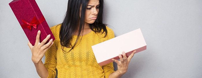 unhappy woman holding box