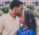 man-kissing-woman-on-forehead