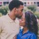 man-kissing-woman-on-forehead