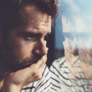 sad man looking out