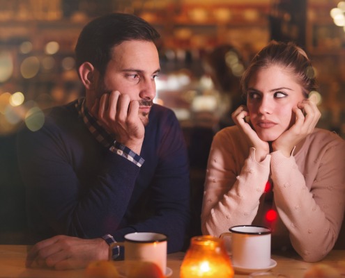 sad-couple-at-bar