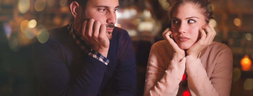 sad-couple-at-bar