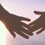 hands-touching-sunset