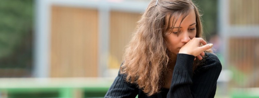 sad-woman-on-bench