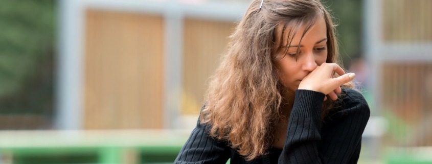 sad-woman-on-bench