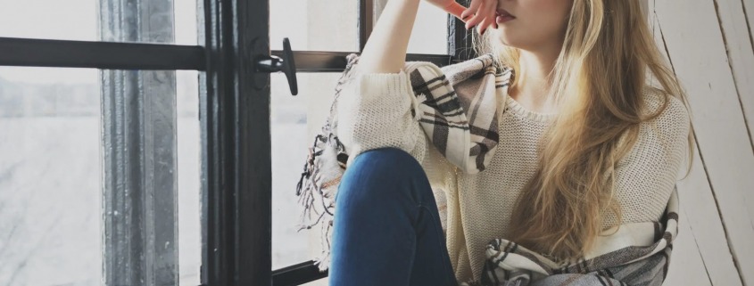 woman-thinking-in-window