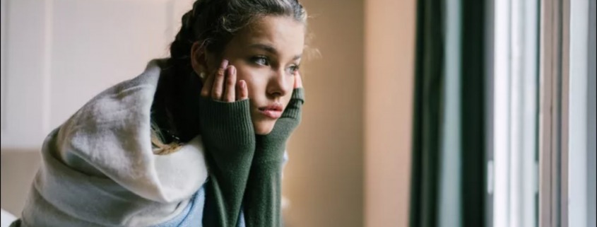 woman-crying-by-window